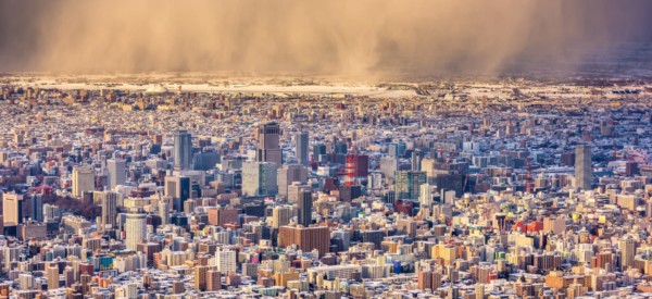 Sapporo, Japan downtown skyline with approaching snow storm.