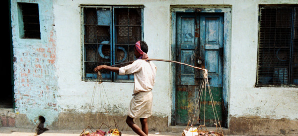Indian man going to market.