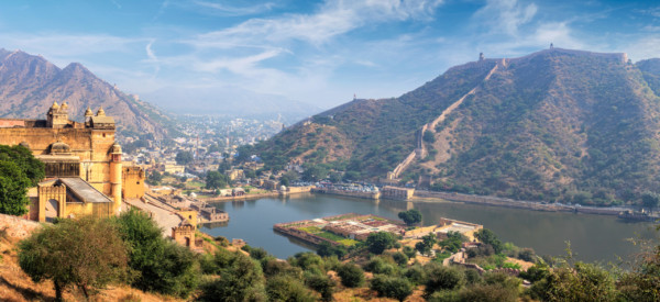 Indian travel famous tourist landmark - panorama view of Amer (Amber) fort and Maota lake, Rajasthan, India